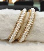 White pearl bangles-and-bracelets