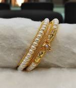 White pearl bangles-and-bracelets