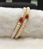 Red pearl bangles-and-bracelets