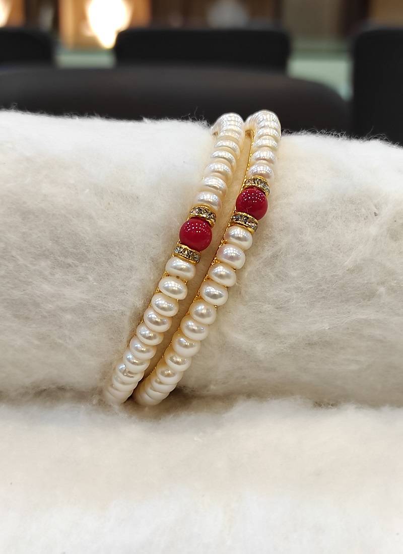 Red pearl bangles-and-bracelets