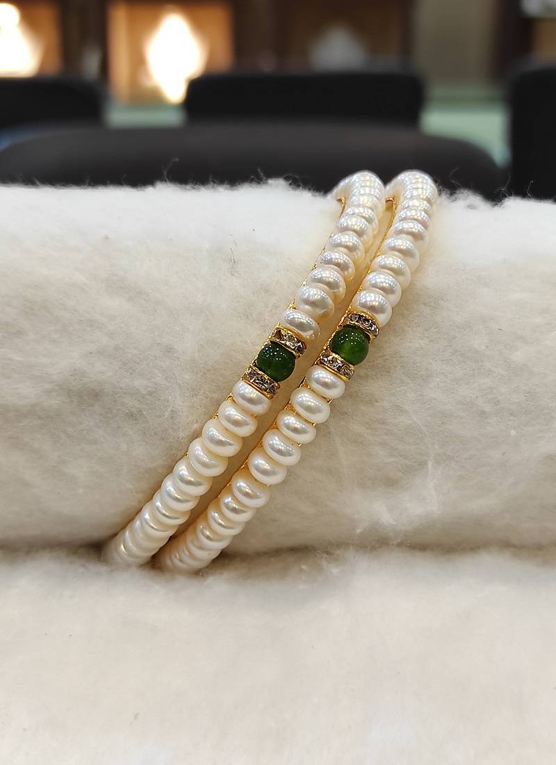 Green pearl bangles-and-bracelets