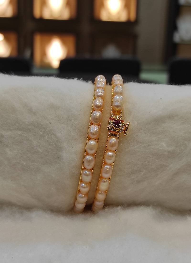 Pink pearl bangles-and-bracelets