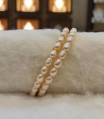 White pearl bangles-and-bracelets