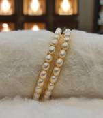 White pearl bangles-and-bracelets