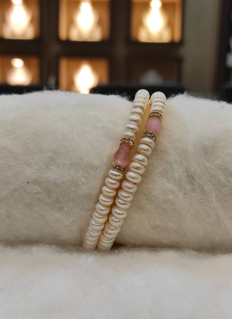 Pink pearl bangles-and-bracelets