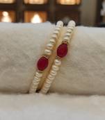 Red pearl bangles-and-bracelets