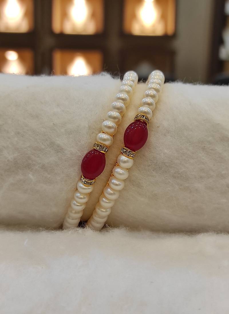 Red pearl bangles-and-bracelets