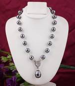 Grey pearl necklaces