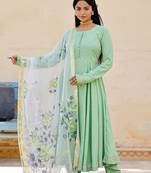 Solid green anarkali suit set with hand painted organza dupatta