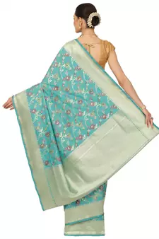 Green woven katan silk saree with blouse