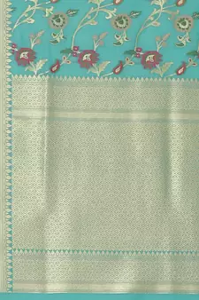 Green woven katan silk saree with blouse