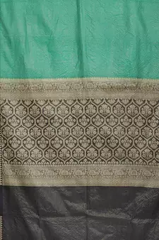 Green woven cotton saree with blouse