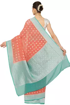 Pink woven georgette saree with blouse
