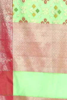 Green woven Faux kanchipuram silk saree with blouse