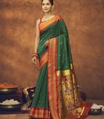 Green woven silk saree with blouse