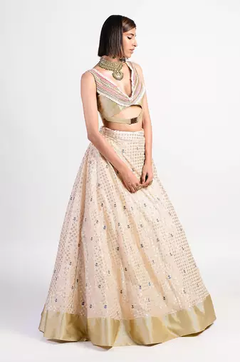 Antique almond white rose lehenga