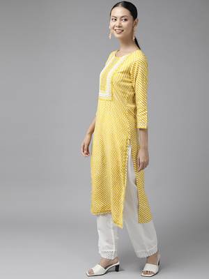 Yellow printed viscose rayon kurtas-and-kurtis 2