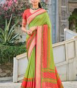 Green brasso patola saree with blouse