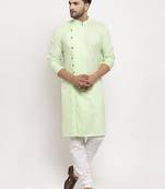 Light Green solid kurta with churidaar pyjama