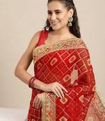 VASTRANAND Red & Golden Sequinned Bandhani Saree