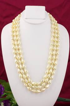 Gold pearl necklaces