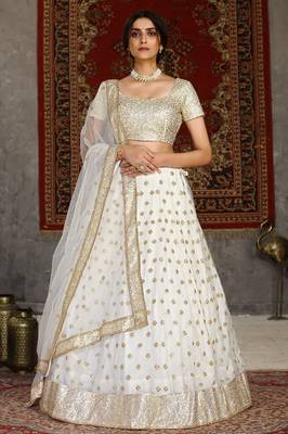 Shubhkala Fascinating White Sequins Embroidered Net Semi Stitched Wedding Lehenga 1