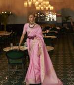 Light pink woven silk saree with blouse