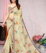 Light yellow printed organza saree with blouse