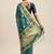 Teal woven organza saree with blouse