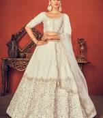 Shubhkala Delightfully Pearl White Thread With Sequins Embroidered Art Silk Semi Stitched Lehenga