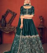 Shubhkala Bewitching Rama Green Thread And Sequins Embroidered Silk Wedding Lehenga Choli