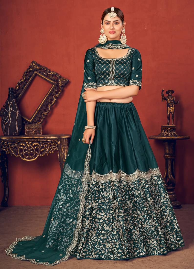 Shubhkala Bewitching Rama Green Thread And Sequins Embroidered Silk Wedding Lehenga Choli