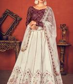Shubhkala Beauteous Pearl White & Wine Thread And Sequins Embroidered Art Silk Lehenga Choli