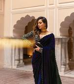 Blue embroidered velvet saree with blouse