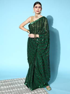 Dark green plain georgette saree with blouse 1