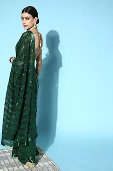 Dark green plain georgette saree with blouse