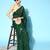 Dark green plain georgette saree with blouse