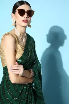 Dark green plain georgette saree with blouse