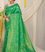 Green woven kanchipuram silk saree with blouse