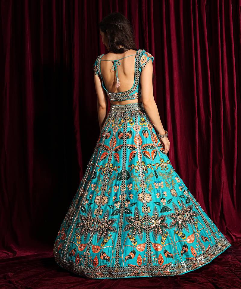 Turquoise Heavy Embroidered Lehenga Blouse With A Dupatta