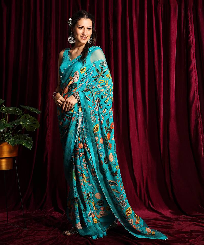 Turquoise Crepe Saree And Blouse