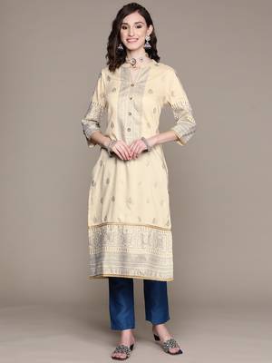 Cream printed art silk kurta sets 1