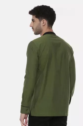green malai cotton short kurta with contrast black collar. pair with denims or linen pants.
