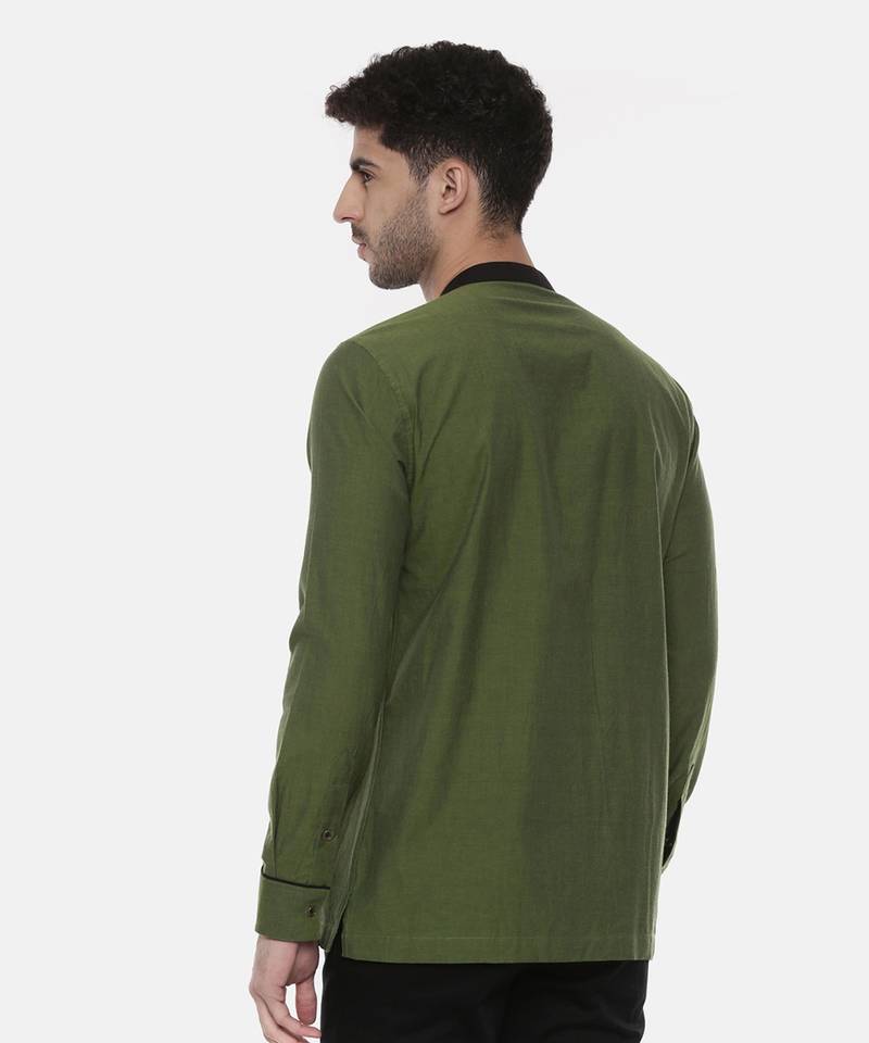 green malai cotton short kurta with contrast black collar. pair with denims or linen pants.
