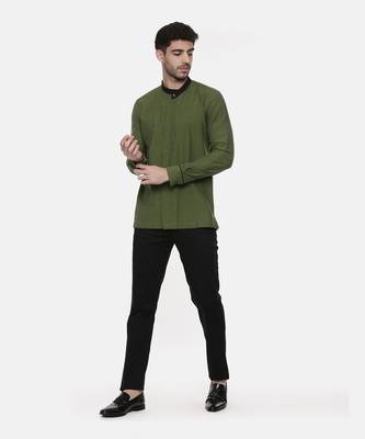green malai cotton short kurta with contrast black collar. pair with denims or linen pants. 1