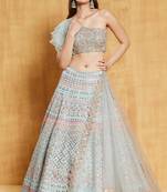 turquoise sequins, zari, and thread embroidered with foil mirror organza semi stitched lehenga