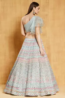 turquoise sequins, zari, and thread embroidered with foil mirror organza semi stitched lehenga