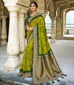 Green woven silk saree with blouse