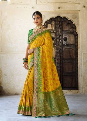 Yellow woven silk saree with blouse 1
