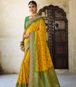 Yellow woven silk saree with blouse